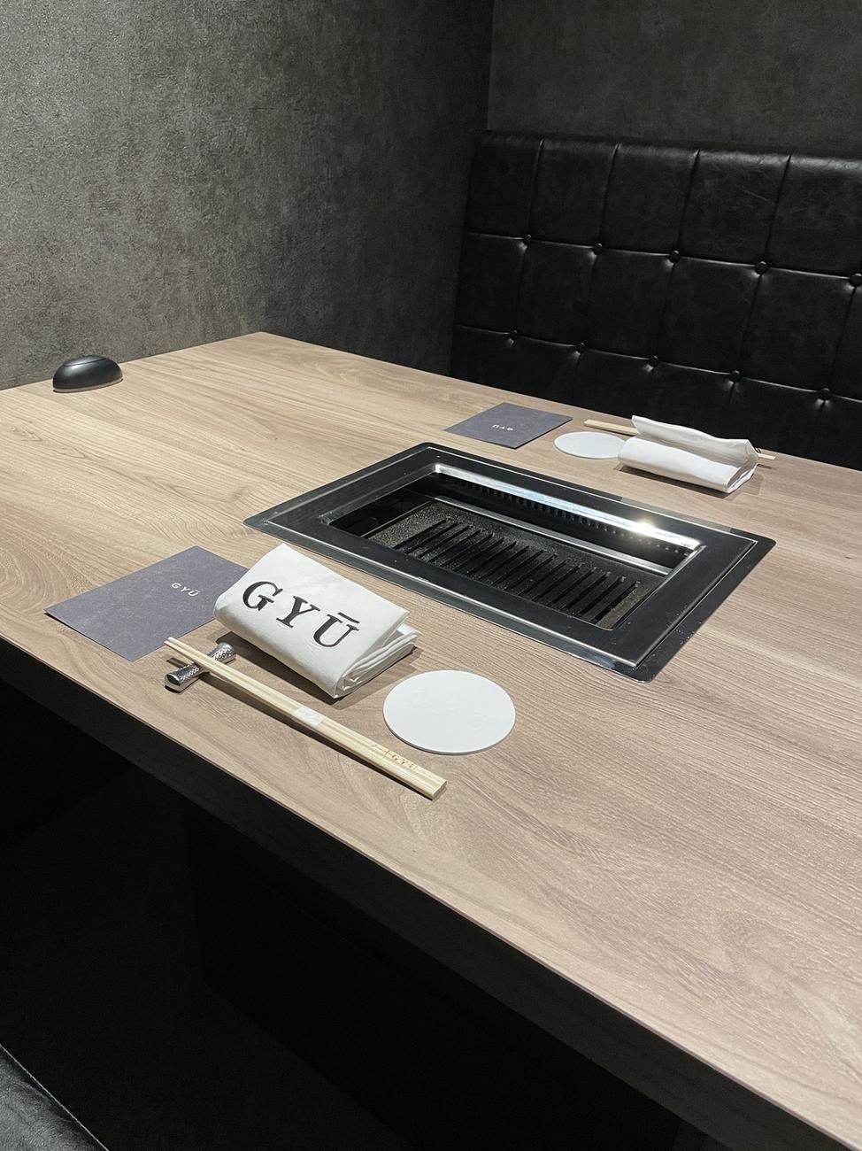 Private room table at GYU CHIBA with a smokeless yakiniku roaster