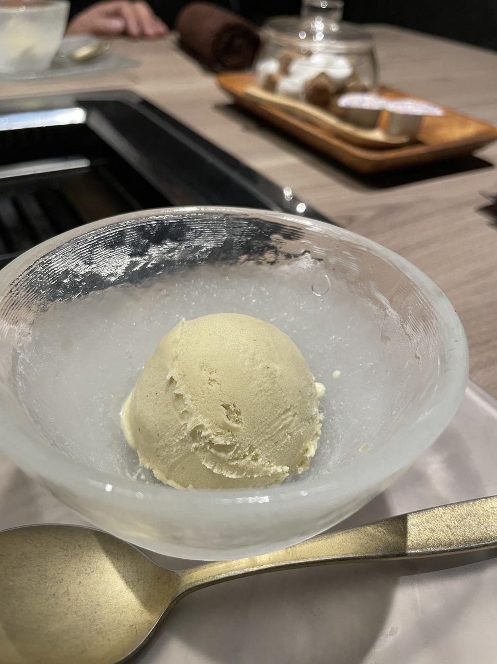 Ice cream dessert served in a glass bowl at the end of a GYU CHIBA course