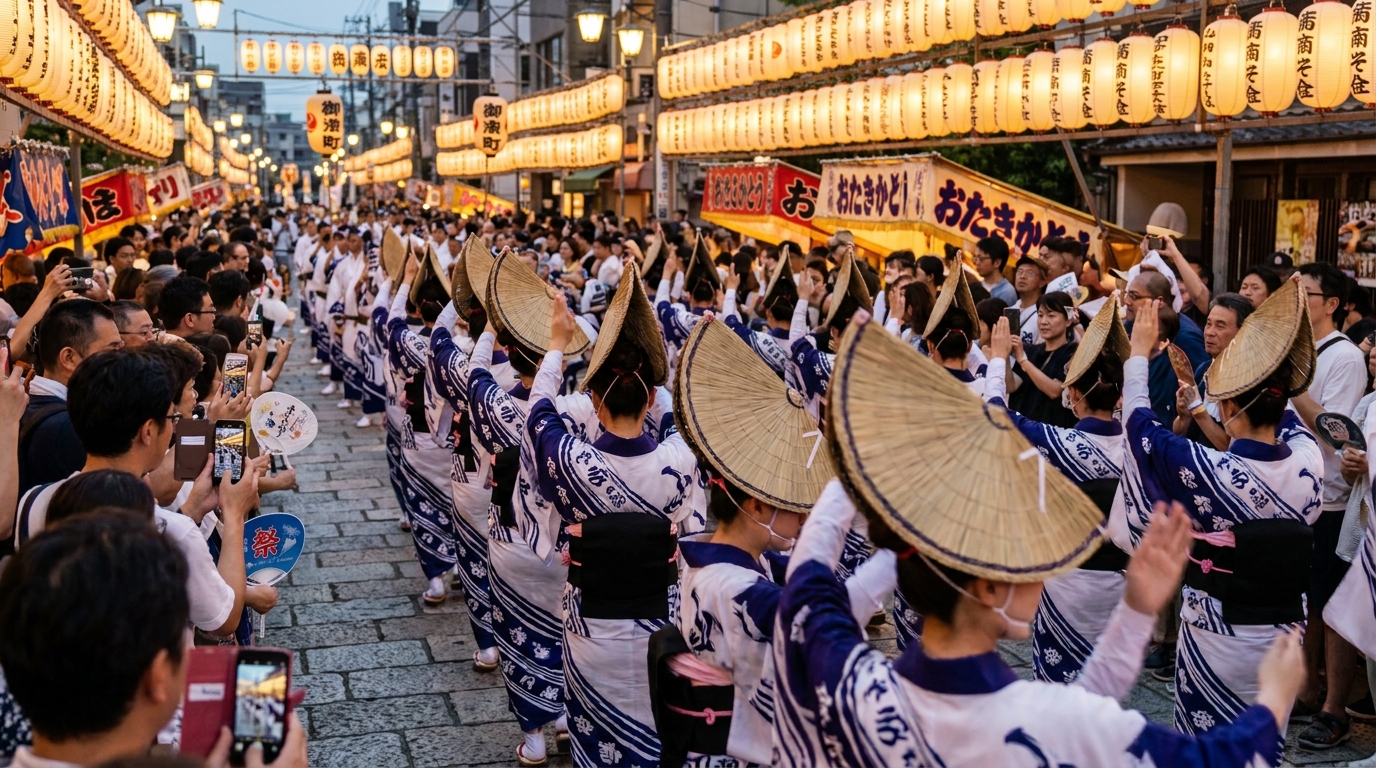 Awa odori dancers in amigasa straw hats performing on a festival street
