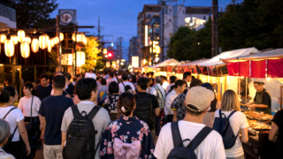 Photo-real AI image of an evening Japanese festival street with lanterns, yatai food stalls, and crowd flow.