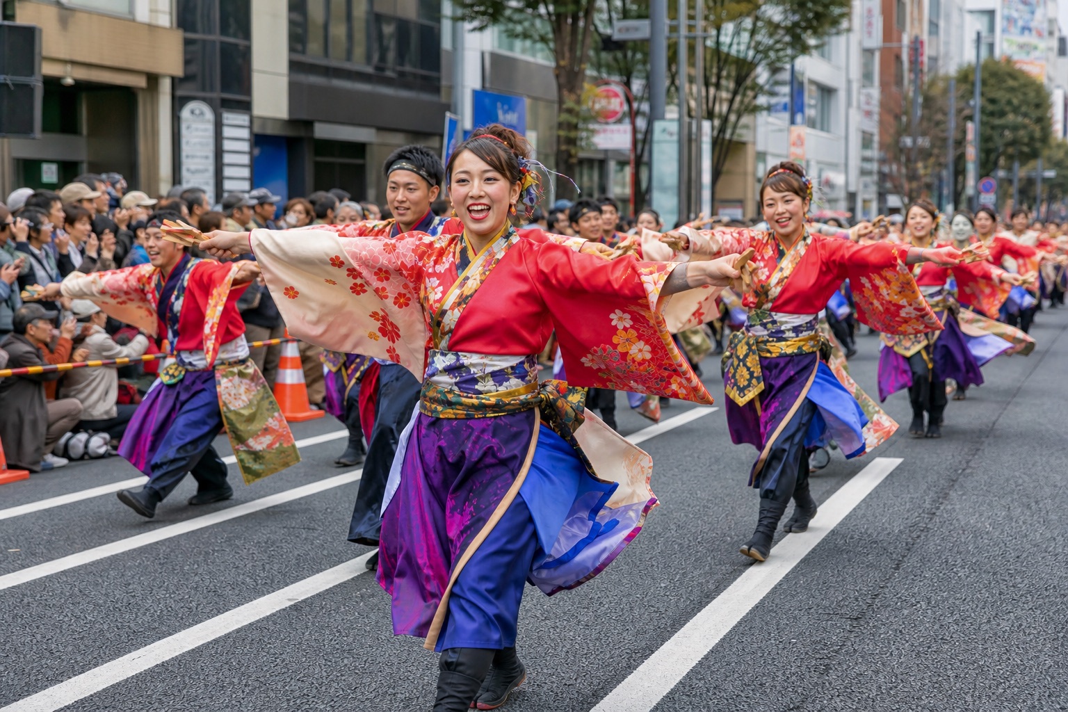 Yosakoi dancers performing in an orderly Tokyo street festival