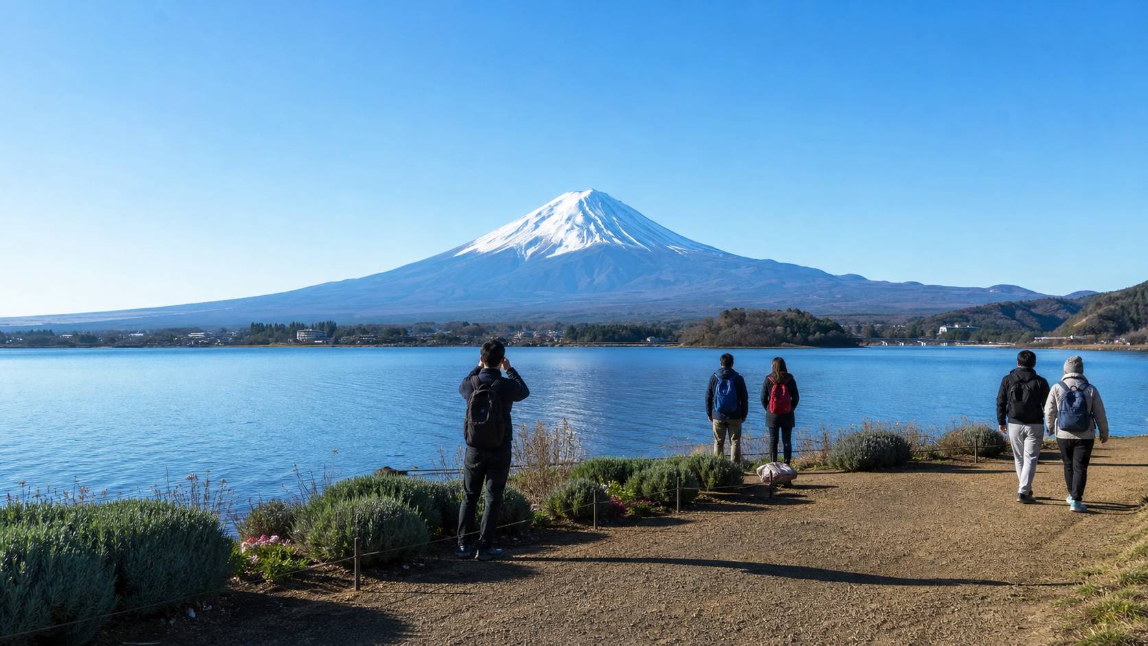 Visitors seeing Mount Fuji from Oishi Park on a clear morning