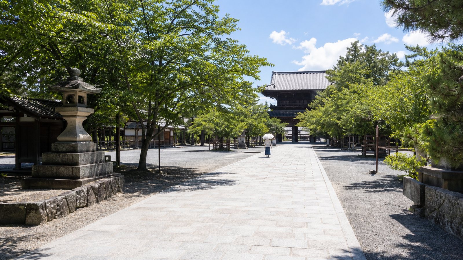 Sunny Japanese temple approach showing exposed midday walking conditions