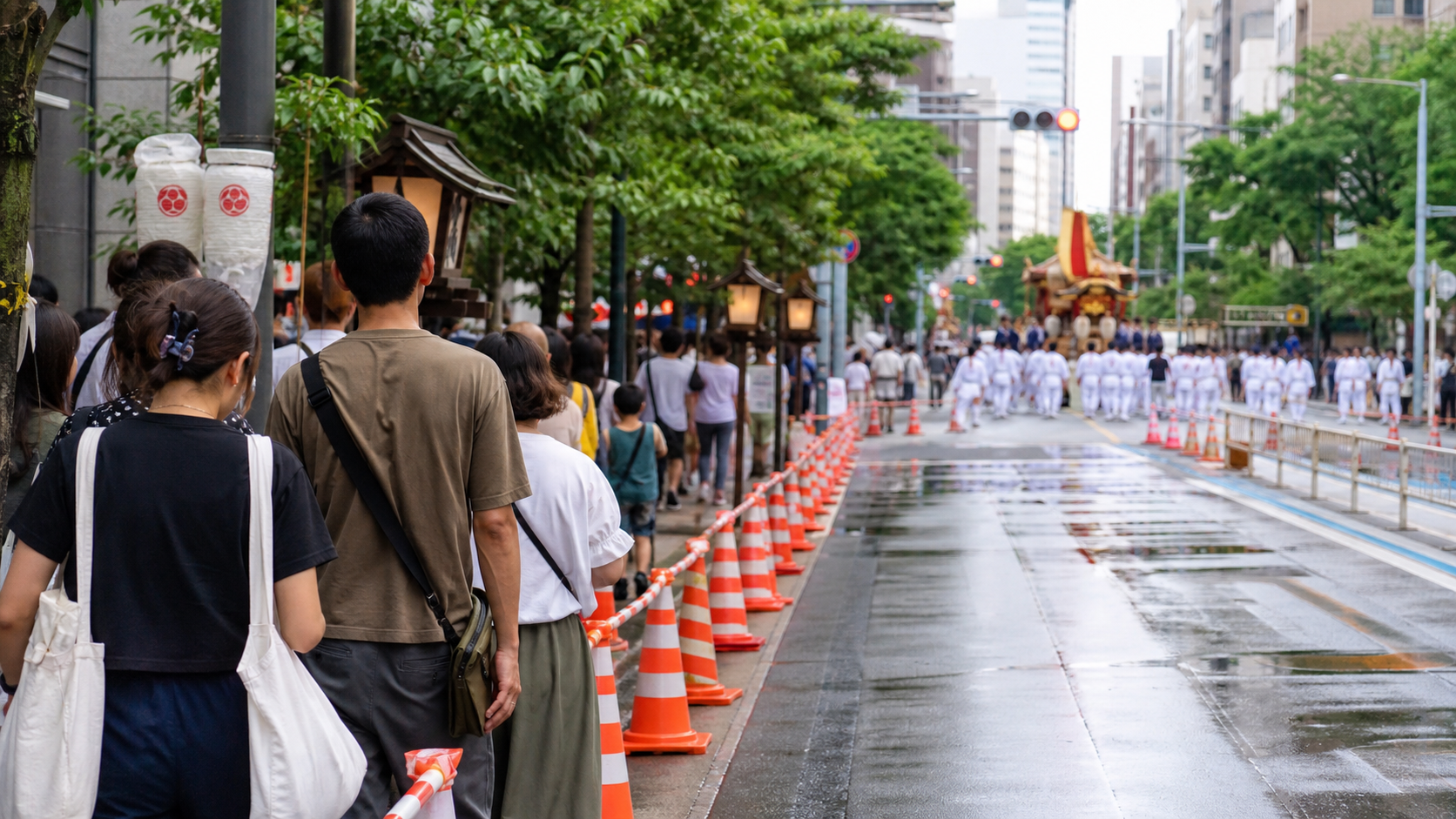 Pedestrians beside a coned-off Tokyo festival route after rain.