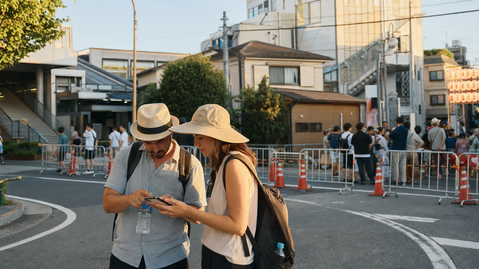 Travelers arriving early near Koenji for a summer festival