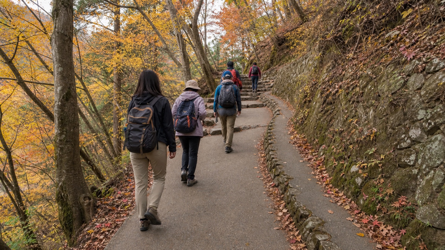 Hikers climbing the paved Trail 1 route on Mt. Takao
