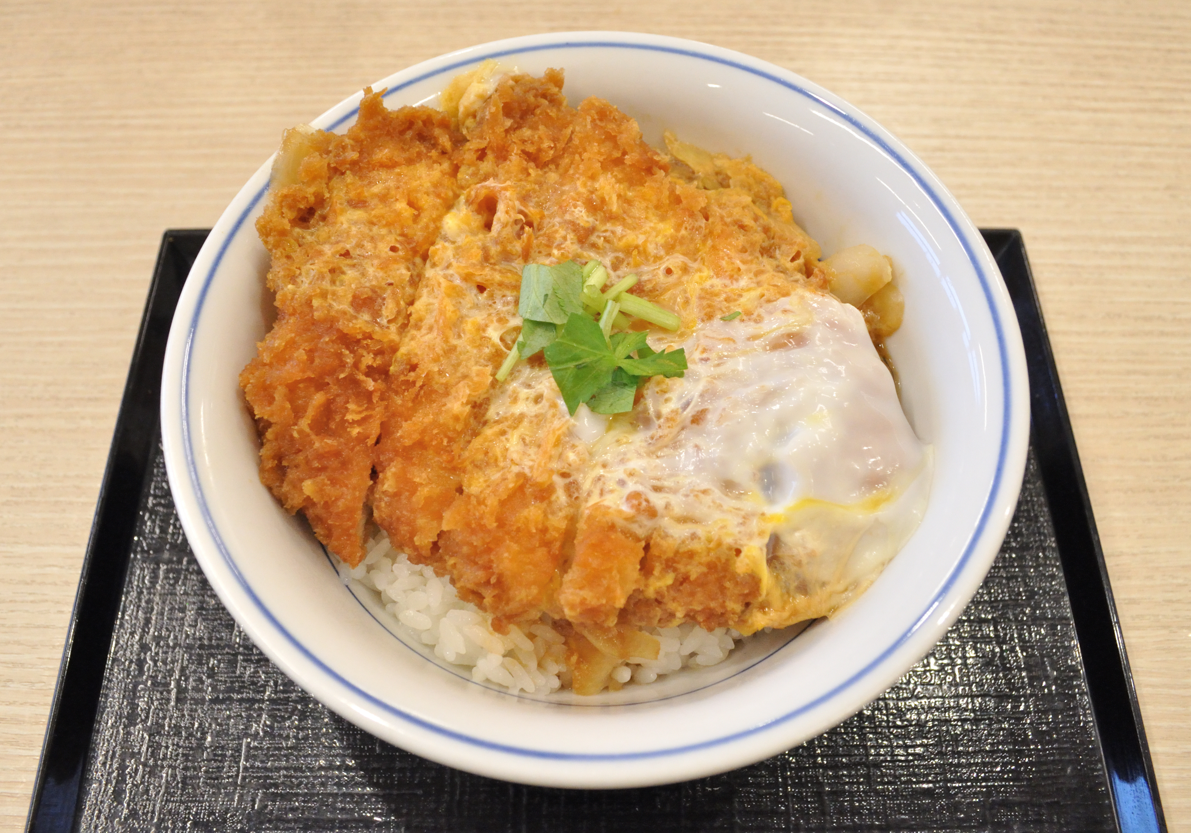 Egg-bound katsudon with sliced pork cutlet, onion and softly cooked egg over rice