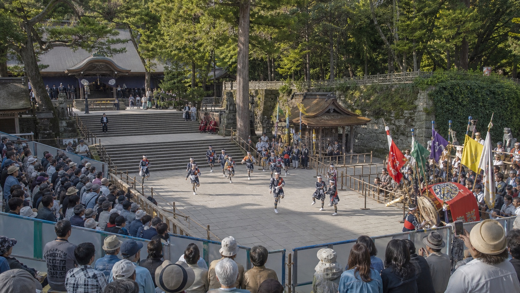 Spectators watching a traditional performance at Suwa Shrine in Nagasaki