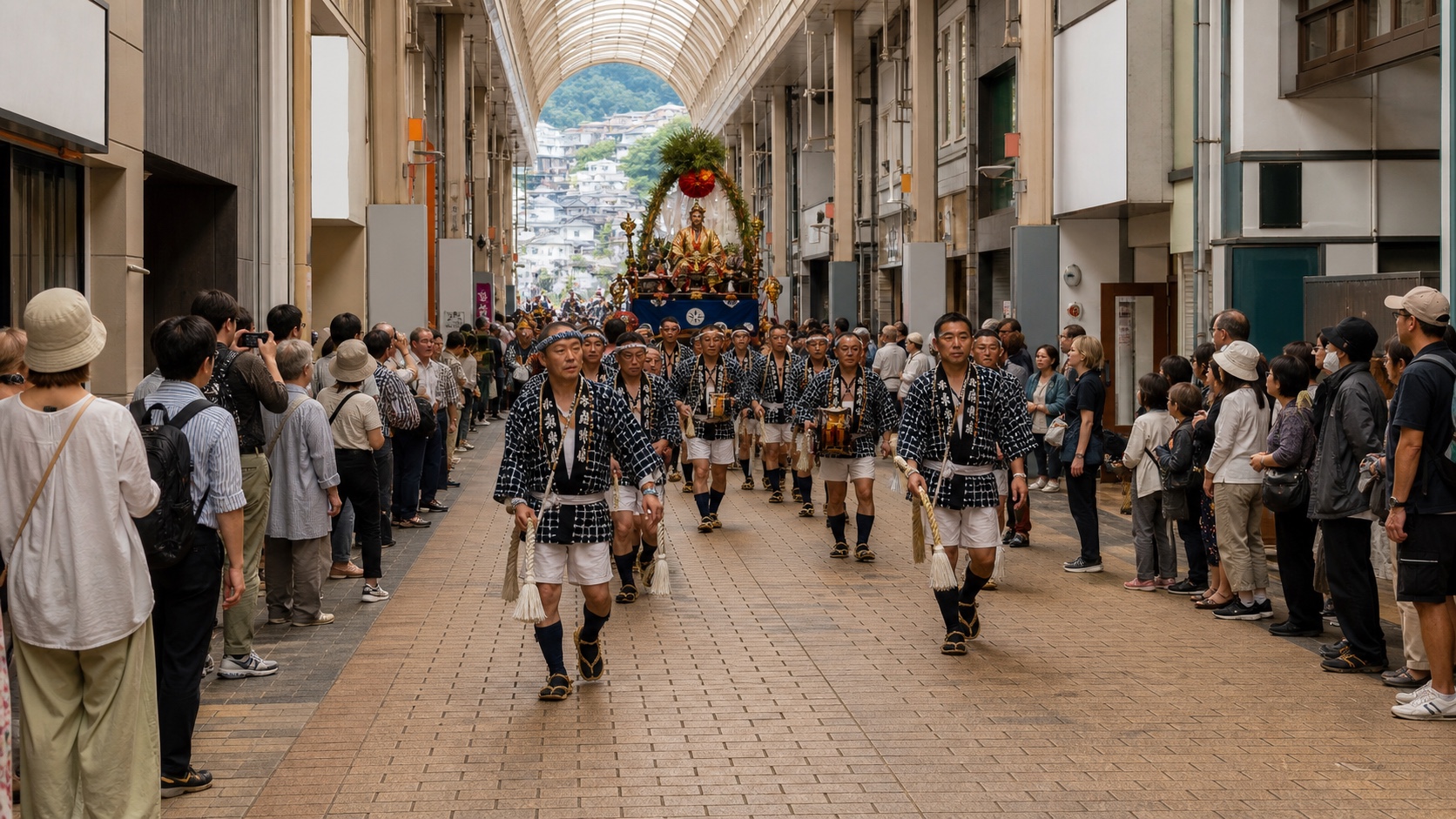 Visitors watching a free Niwasaki Mawari performance in central Nagasaki