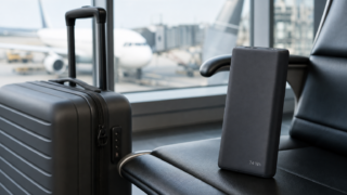 Power bank beside carry-on baggage before a flight in Japan