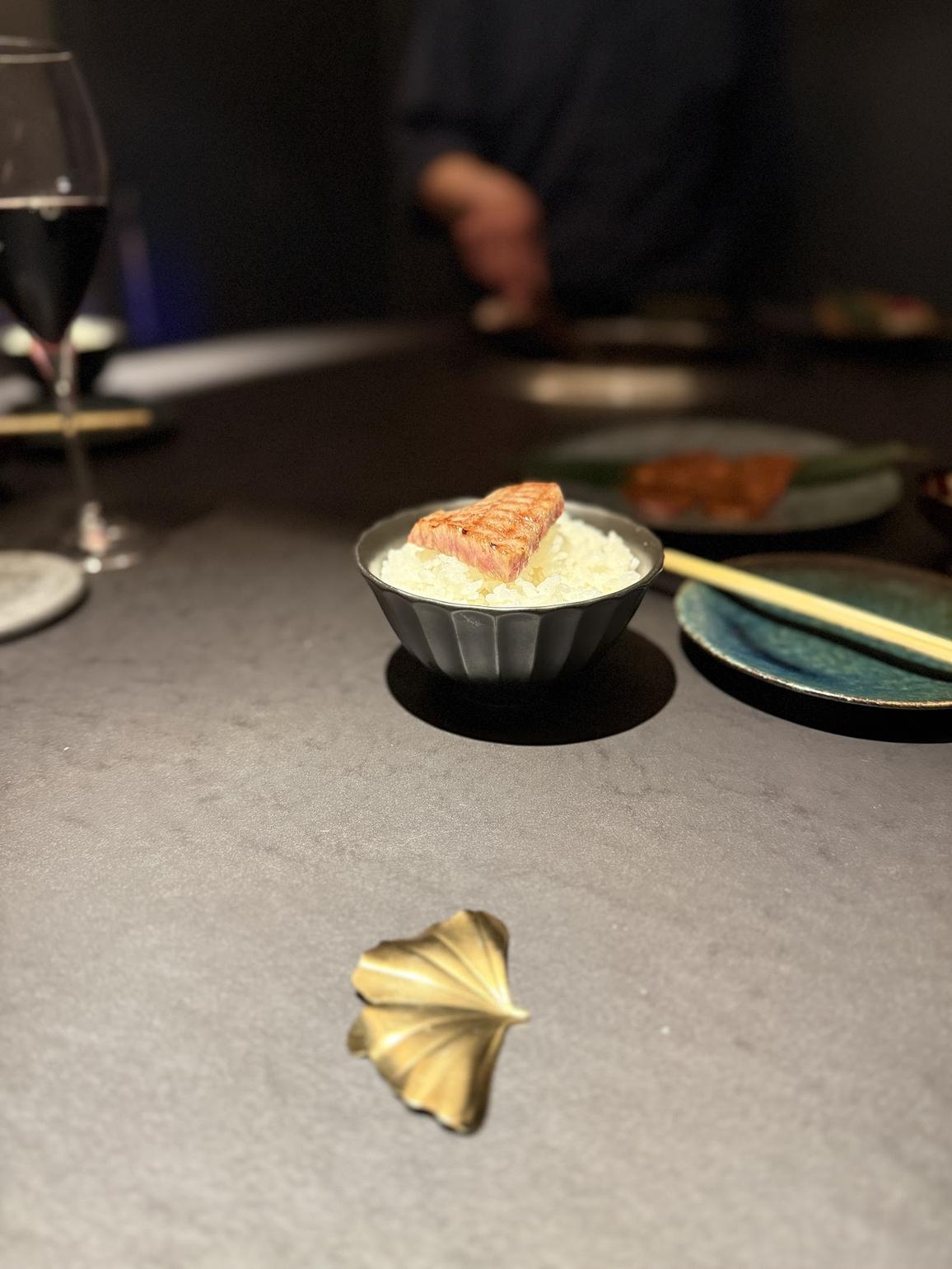 Grilled wagyu served over a bowl of Japanese rice at KIRAMEKI