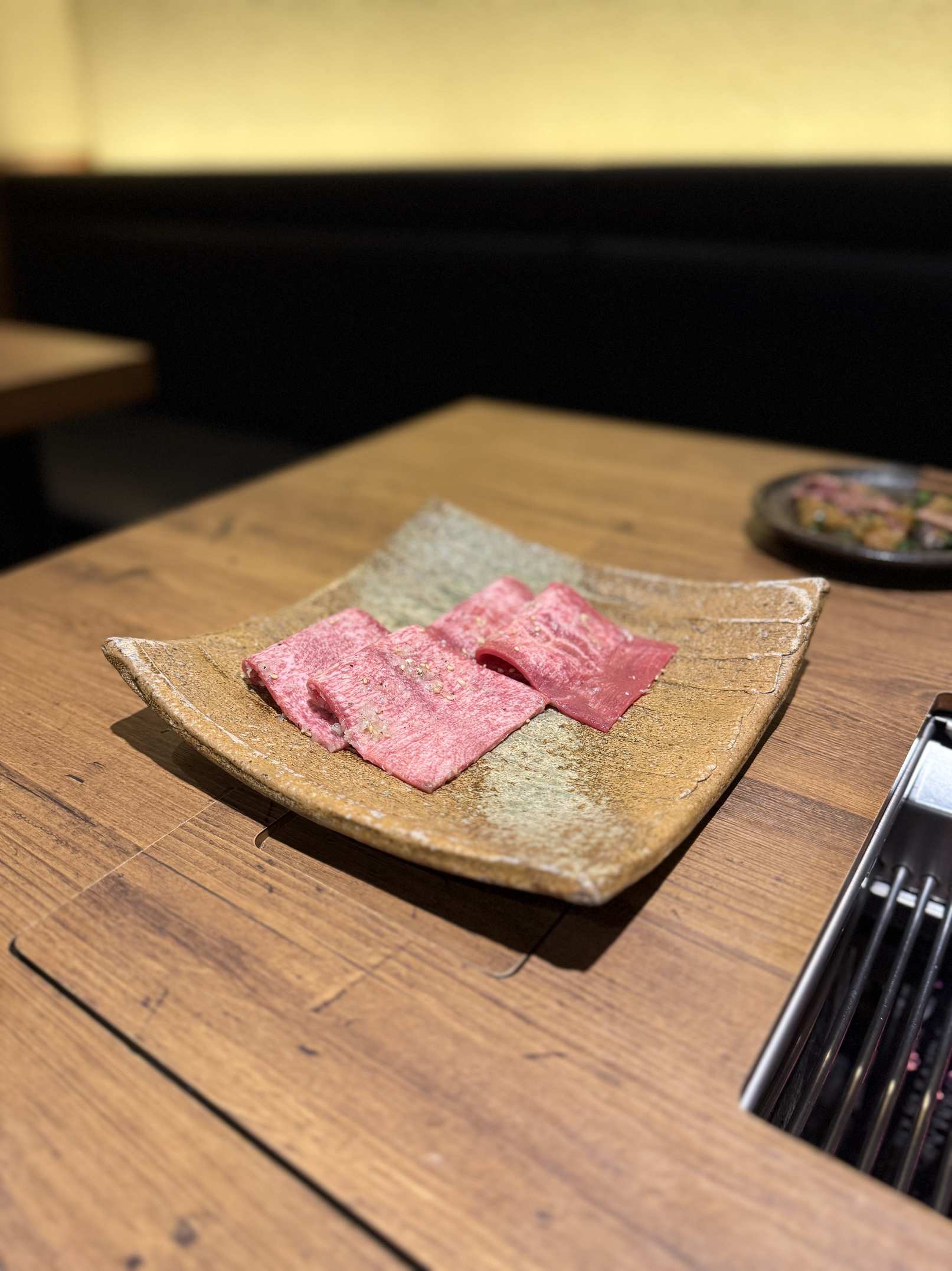 Marbled beef slices ready to grill at Yakiniku Gyusha