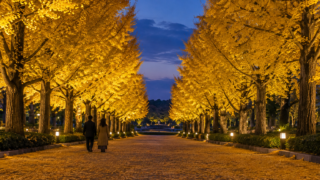 AI-generated illustration: A golden ginkgo avenue at blue hour in an imagined Japanese park.